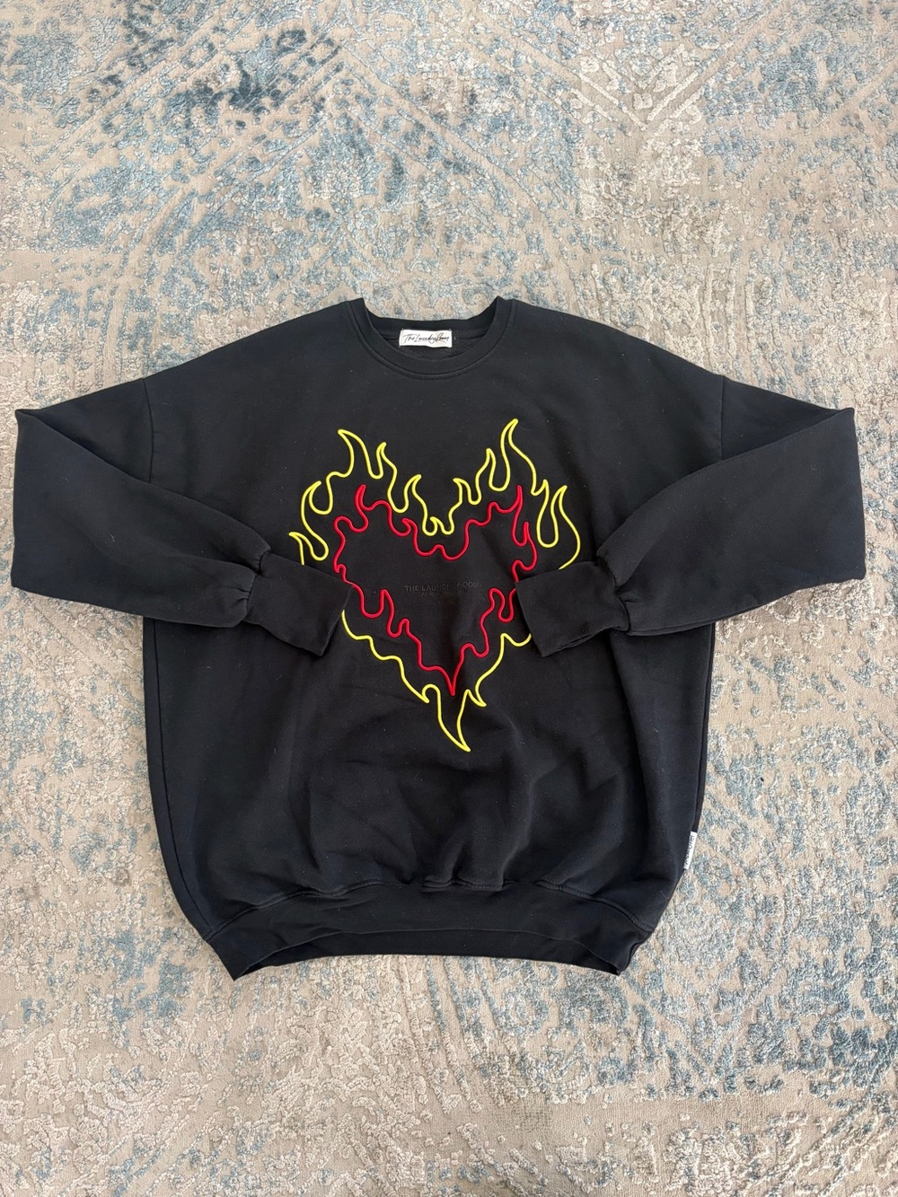 The Laundry Room Black Crewneck with Red and Yellow Flame Heart